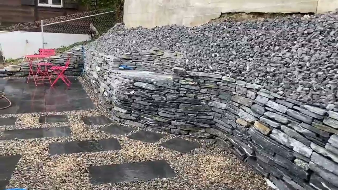 Mur en pierre naturelle & terrasse paysagée | Eggel Création & Design SA