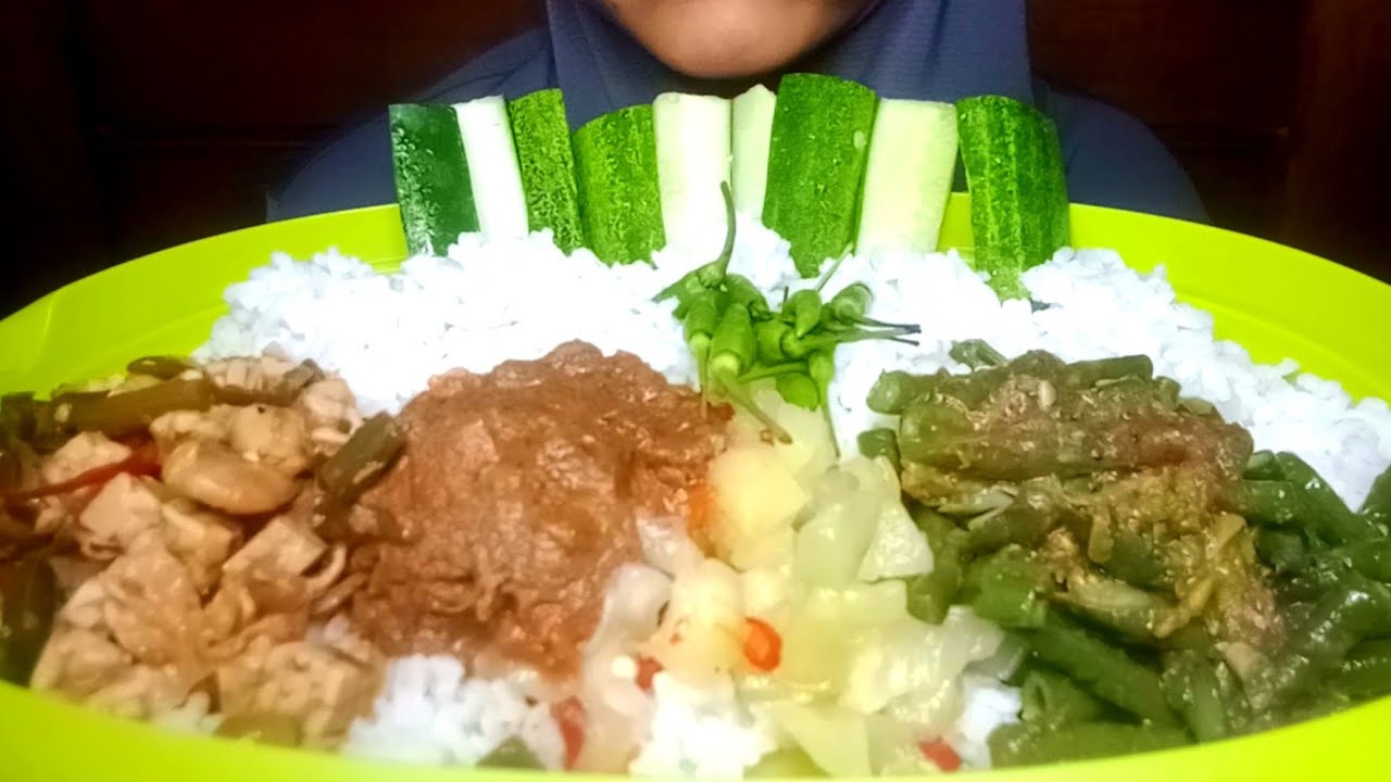 Nasi Rawit Tempe Tauco Rendang Daging Tumis kacang Panjang Acar Dan Timun @ubi9