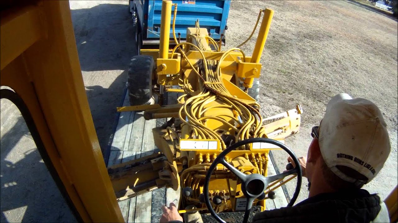 Loading The Motor Grader