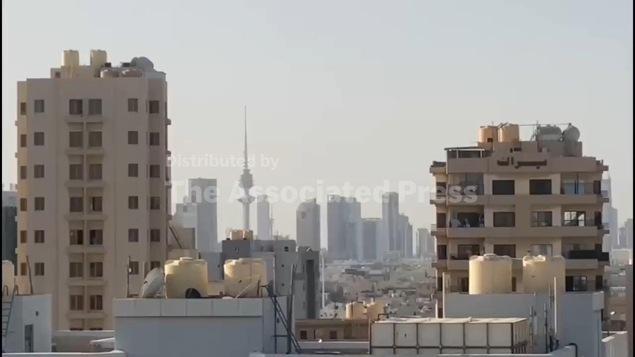 Air raid sirens blare over Kuwait City as explosions heard