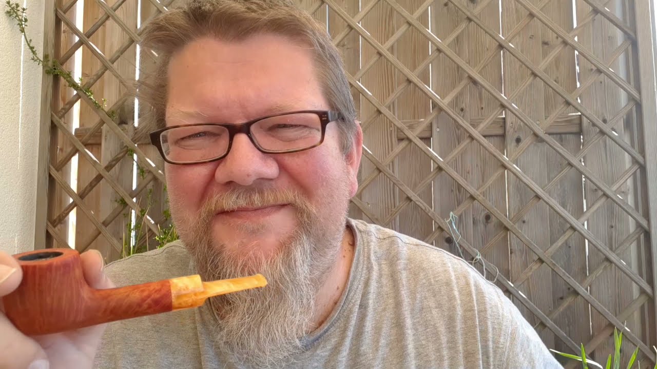 Neue Pfeife (ein)rauchen