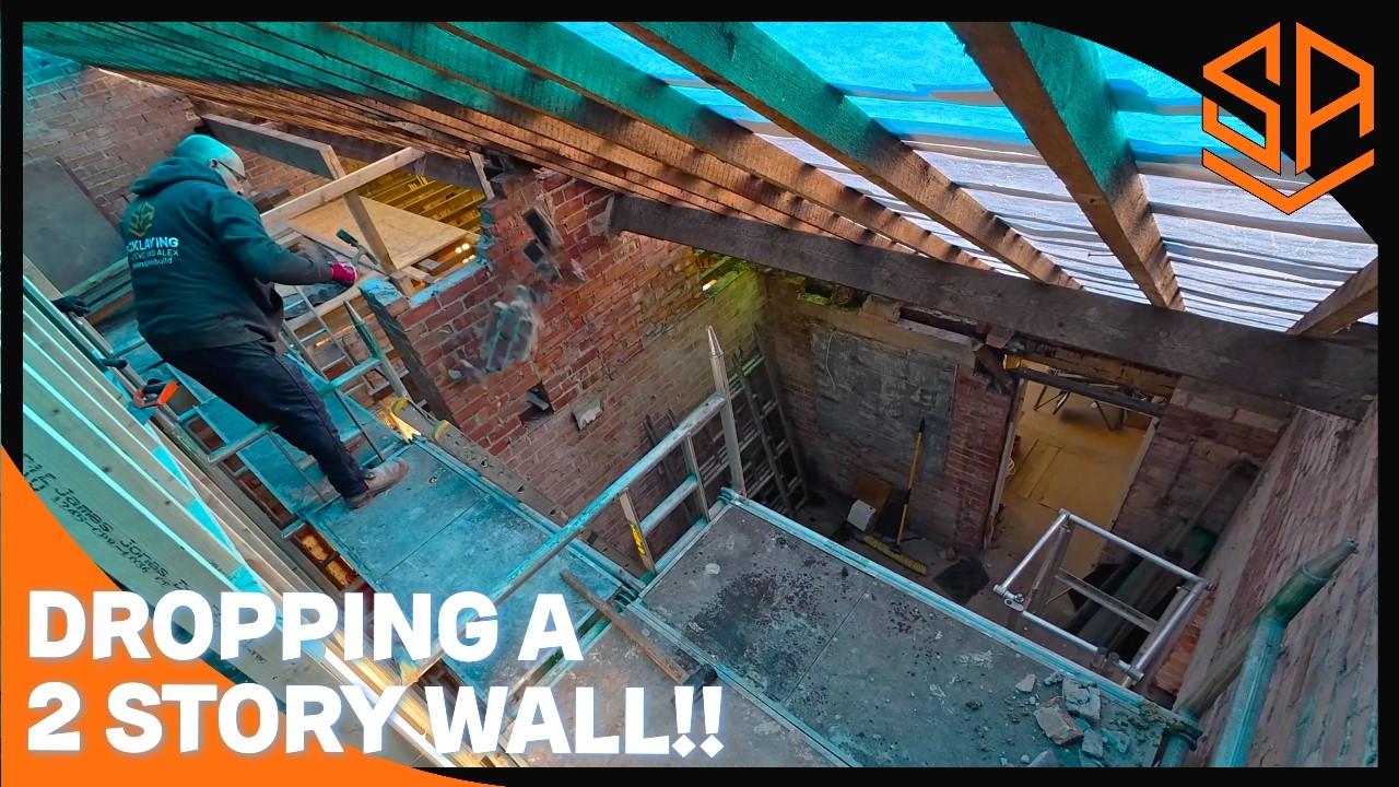 DROPPING A 2 STORY WALL FROM RAFTERS TO FLOOR