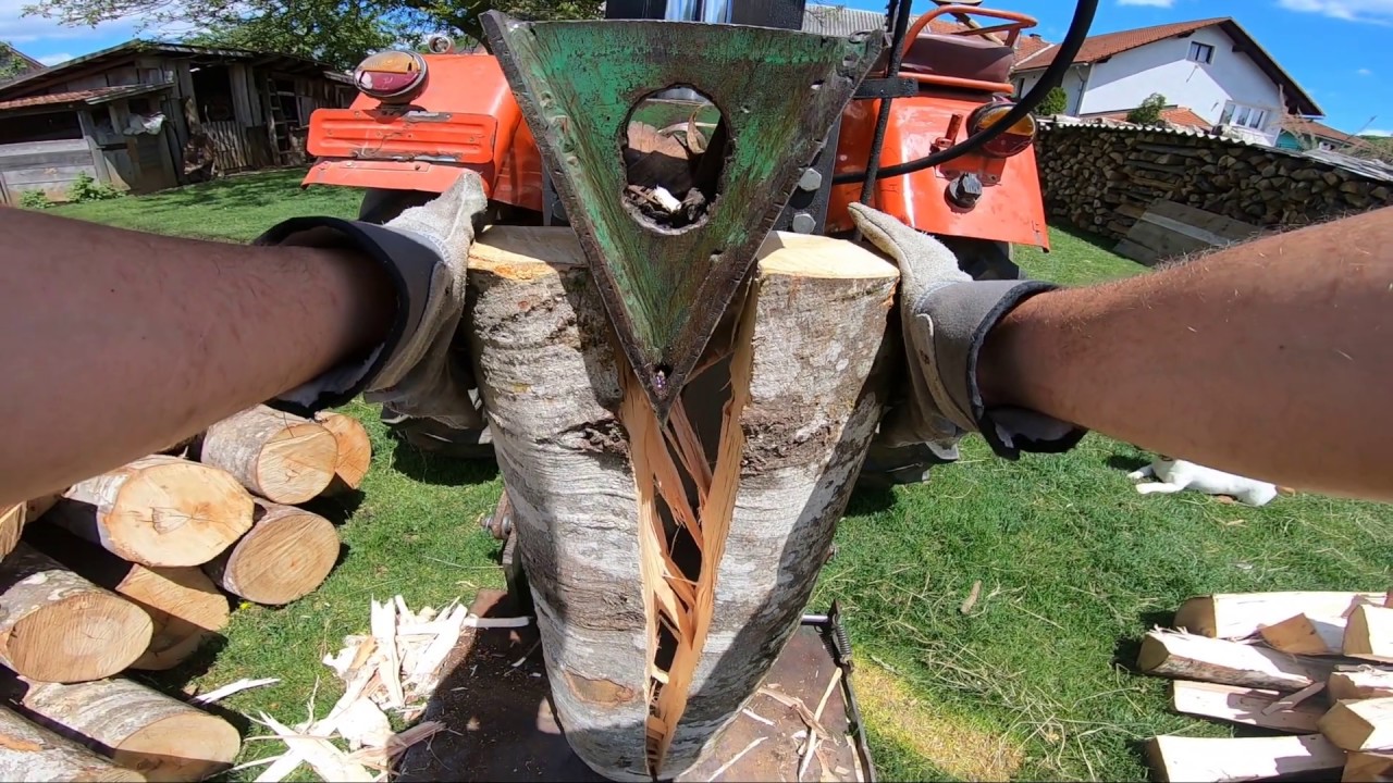 Splitting wood With TRACTOR