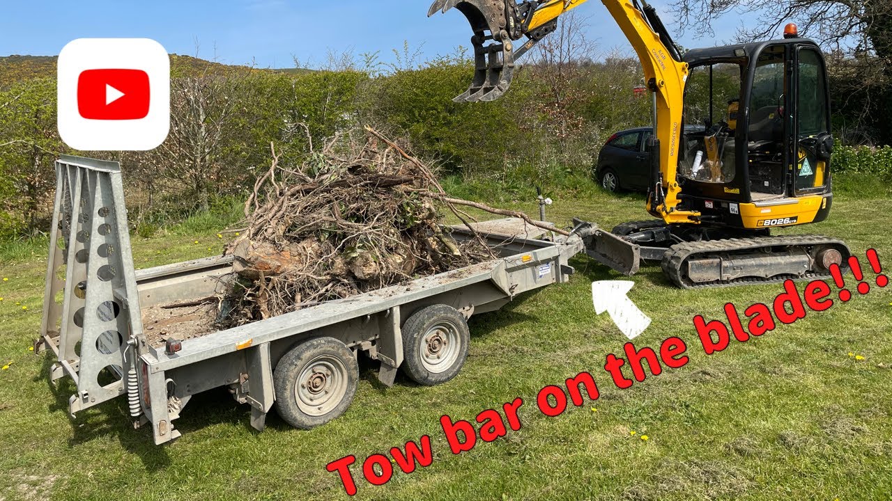 JCB 8026 towing trailer...game changer!!