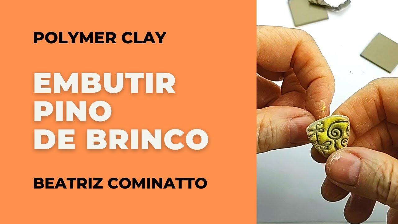 Embutir pinos de brincos no polymer clay.