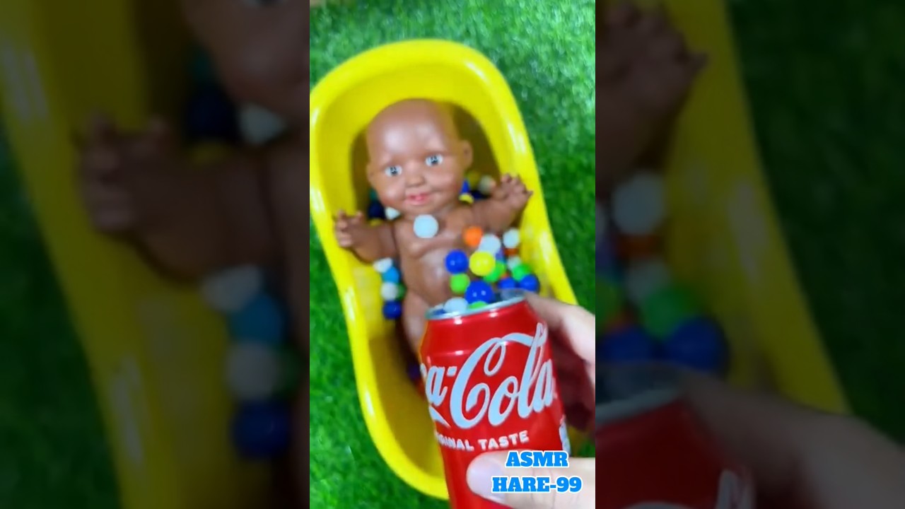 Relaxing ASMR video with colorful balls, a toy baby, and satisfying sounds. 