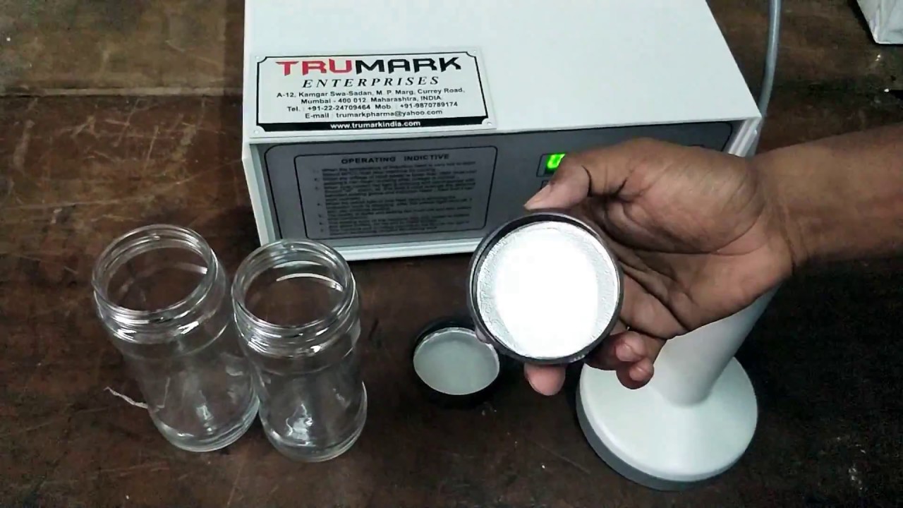 Manual induction sealer - sealing foil on glass jar