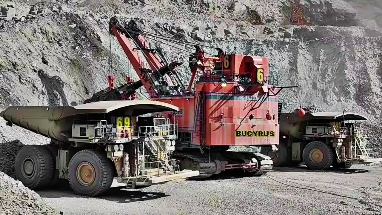 Bucyrus 495 HR Rope Shovel Loading Komatsu 930E Dump Truck