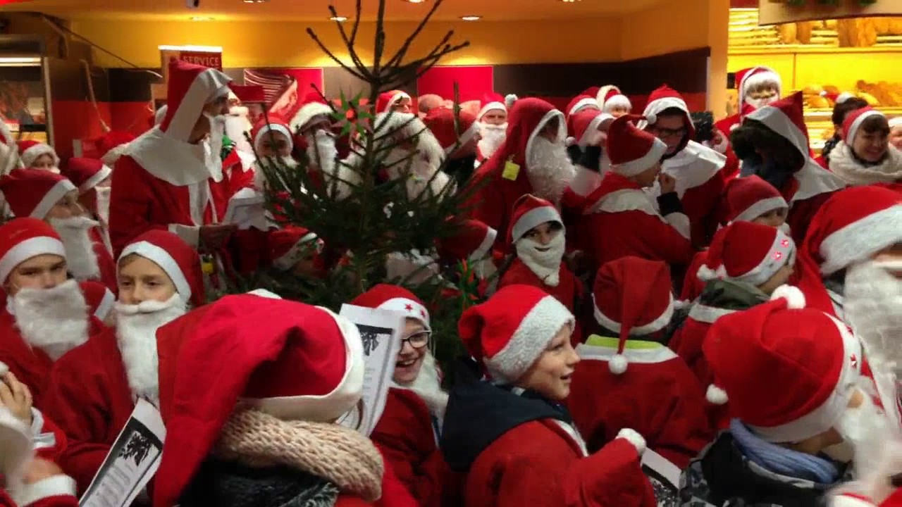 Weihnachtssingen im REWE Markt