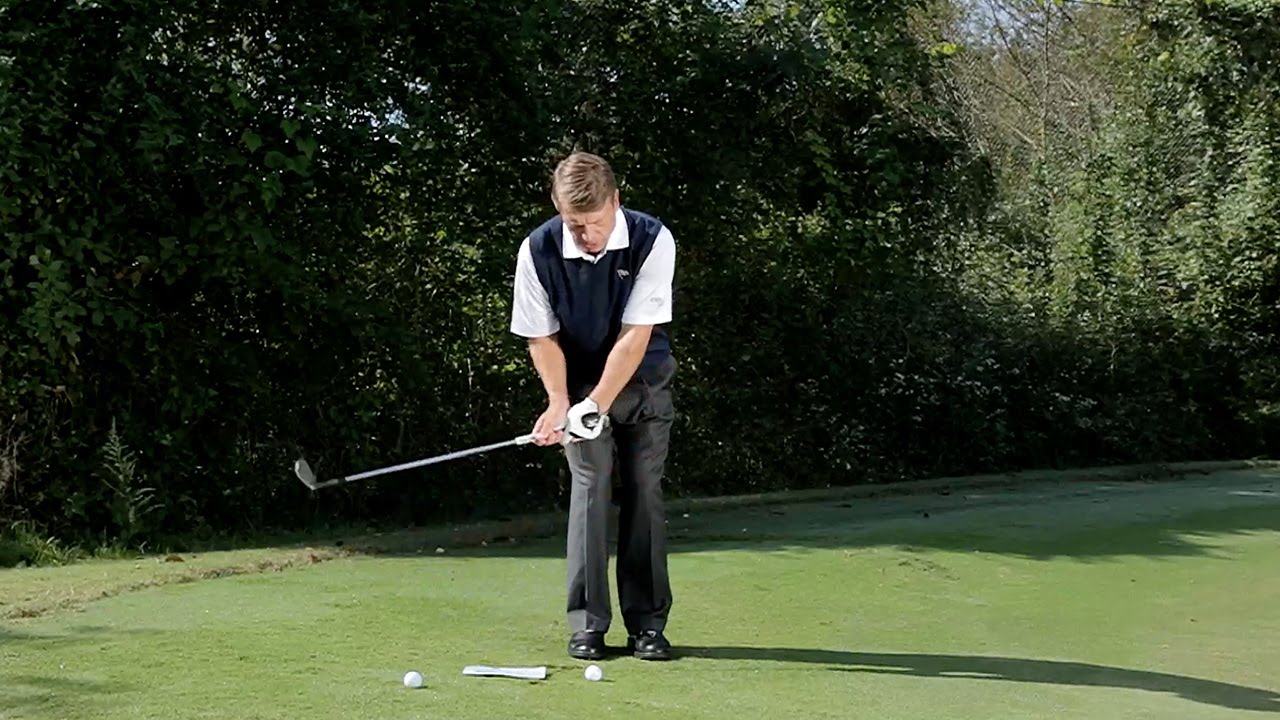 Todd Sones: Stand to the Handle for Tight Chipping | GOLF.com