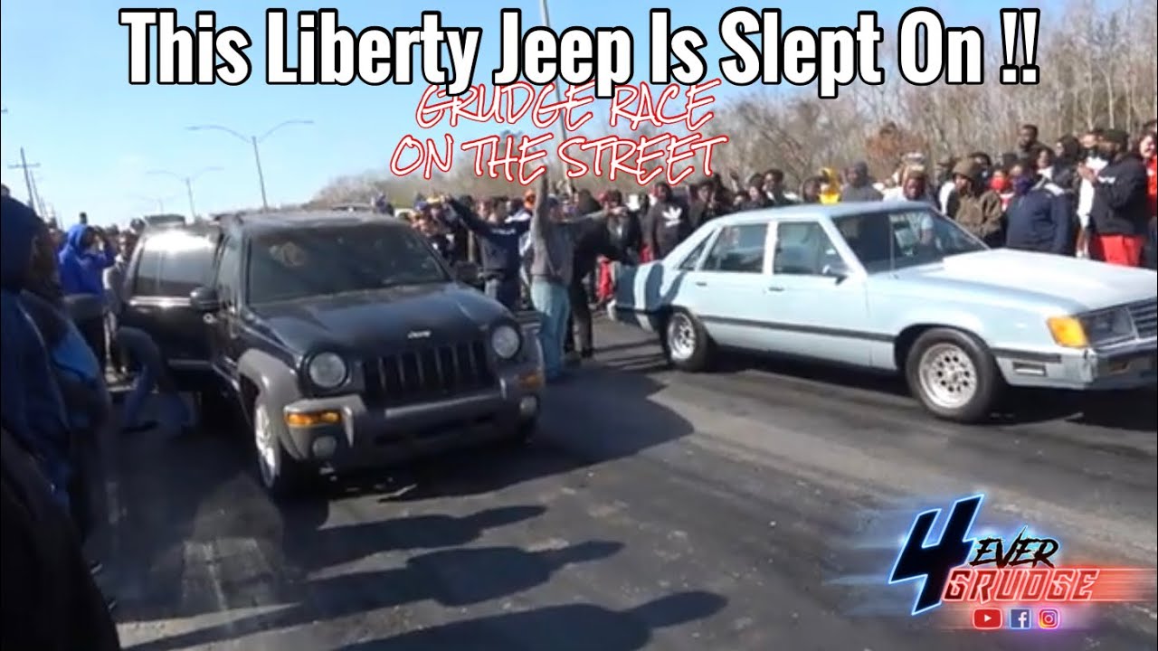 Jeep Liberty on the street carrying the tires !!