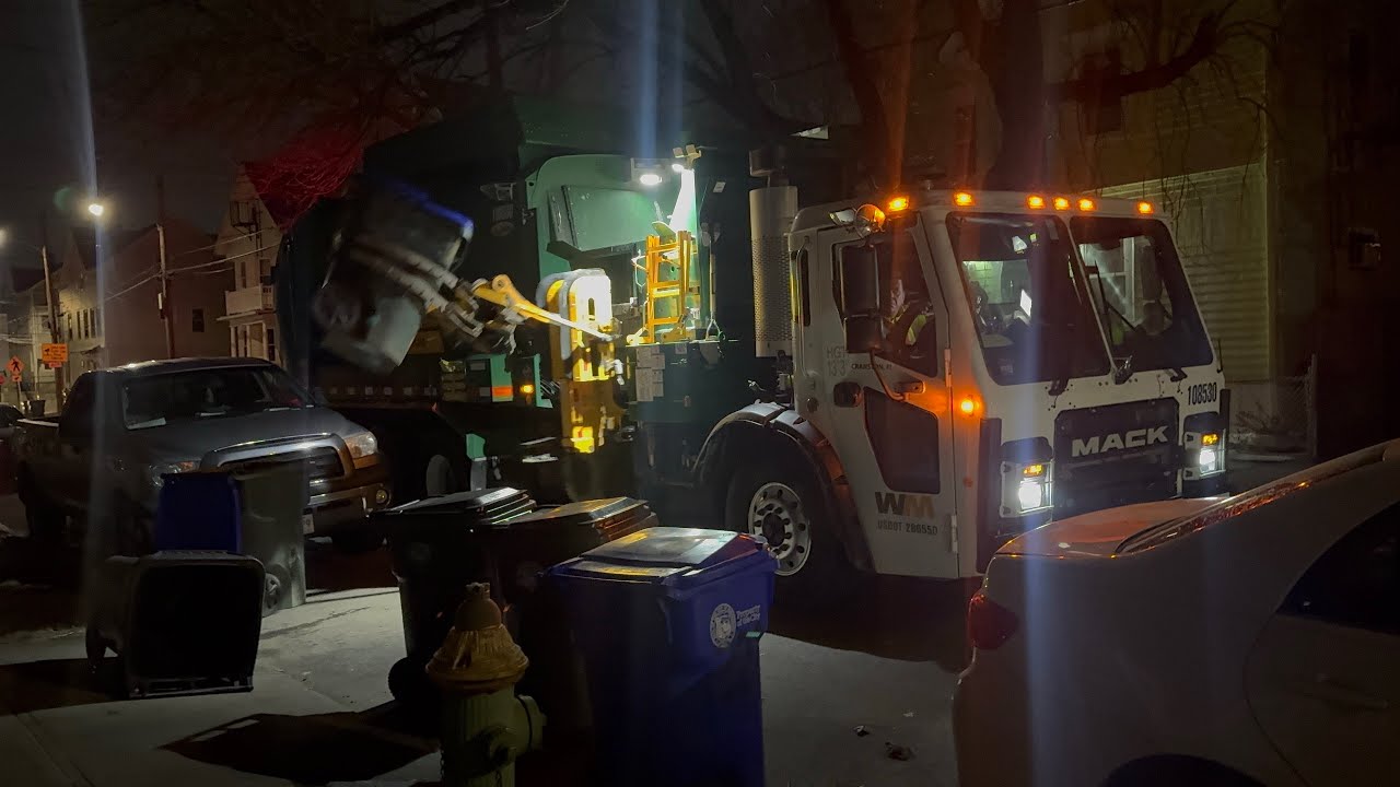 A Recycle Truck In The Dark.