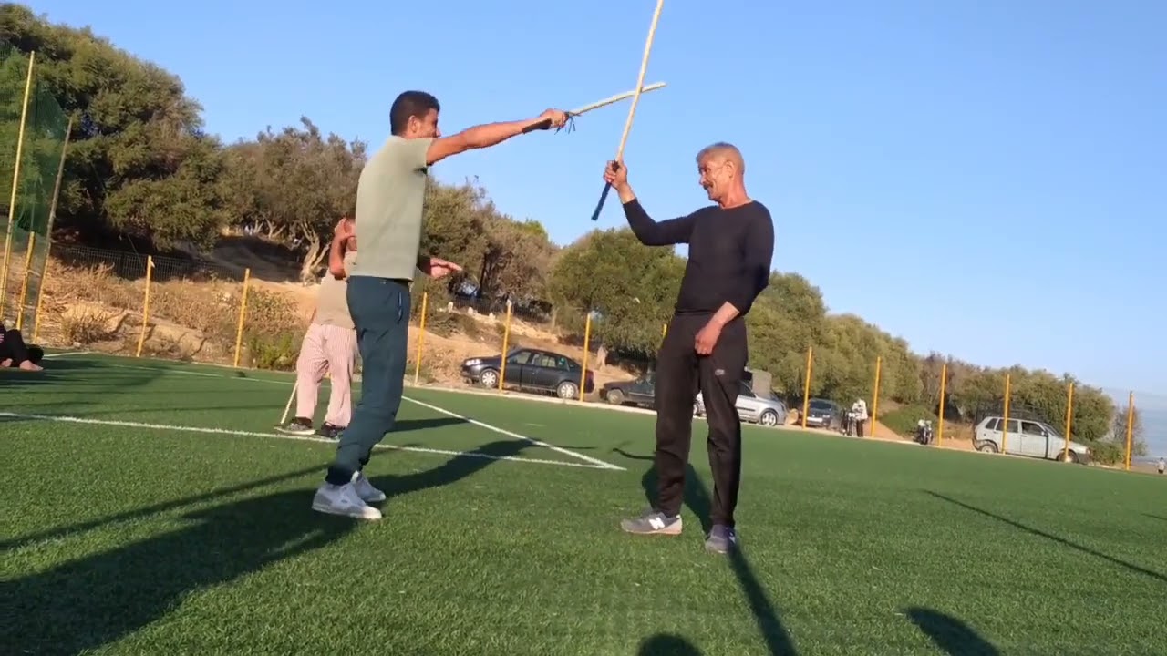 تعليم العصا التقليدية مع الشيخ عبدالقادر الخرفي سيدي راشد Algérien Traditionnelle Combat Stick