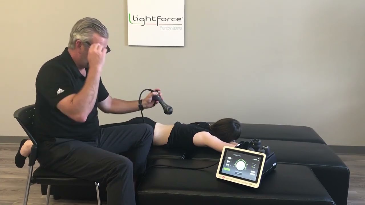 Tratarea zonei lombare cu ajutorul laserului terapeutic Lightforce XLi