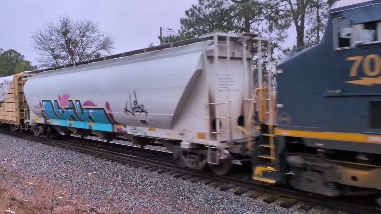 CSX 907 leads a north bound mixed freight train with a mid DPU early Saturday morning 1/10/2026