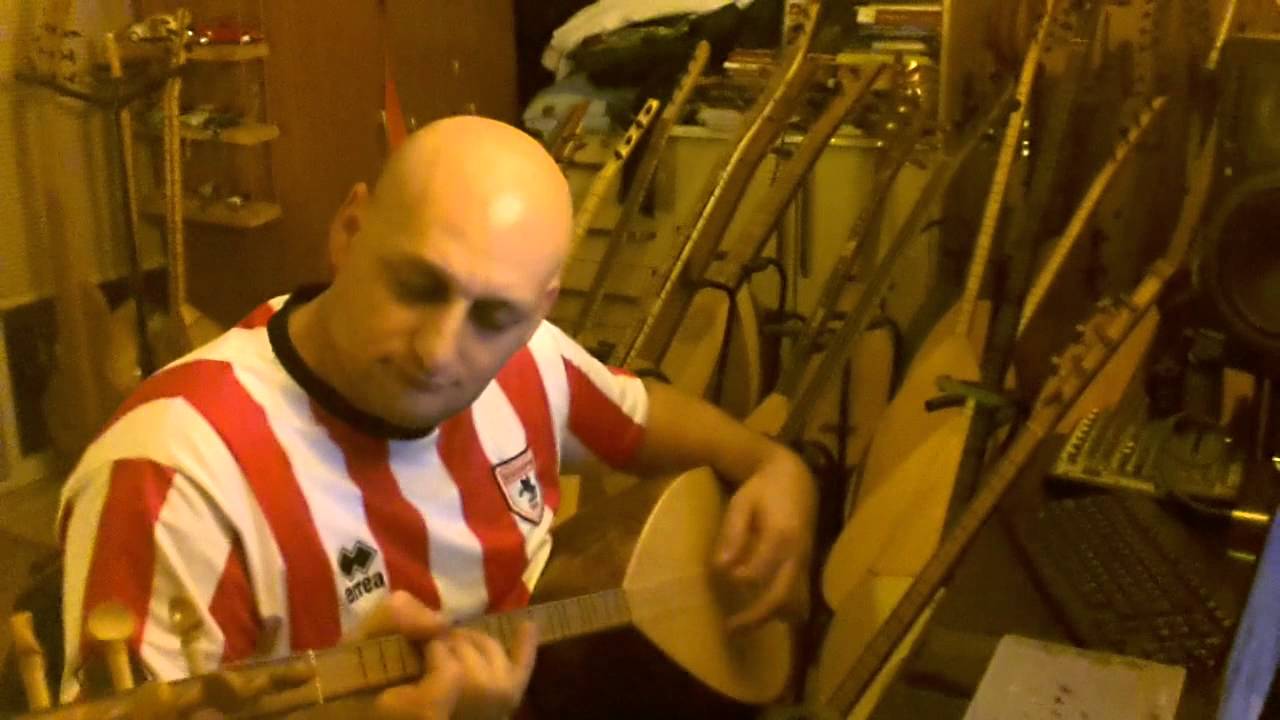 Emin SANCAK 45 cm Oyma Ceviz bağlamam ile.