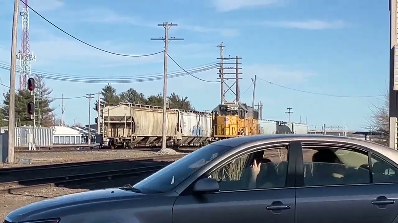 UP 2210 Single Engine w/ K5HL East backs up West, Main St. Railroad Crossing, Fremont NE