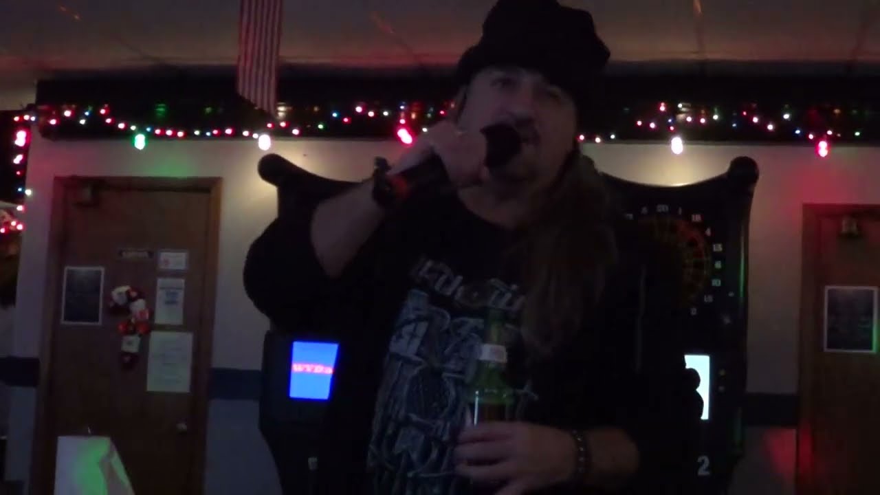 Buck Row singing Call Me Little Sunshine by GHOST at The Elks in Parkersburg on December 12, 2025