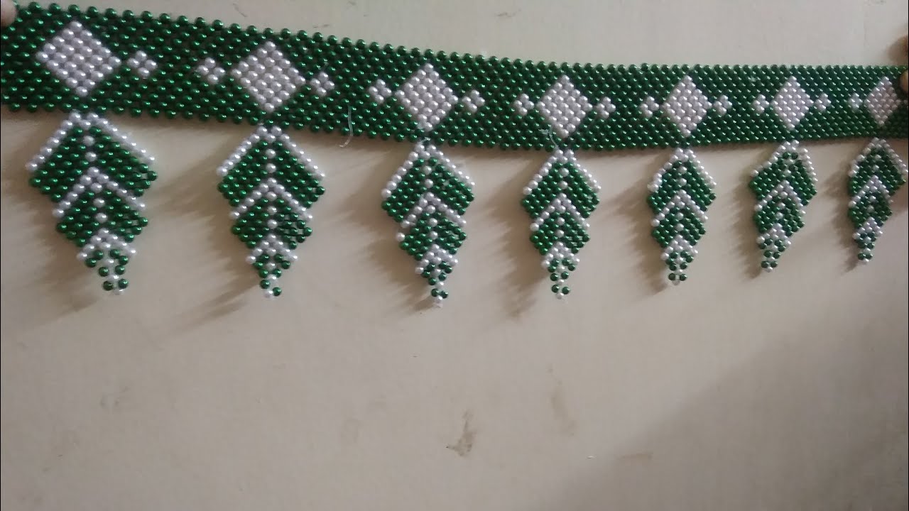 मोत्यांनी बनवलेलं तोरण (beads)