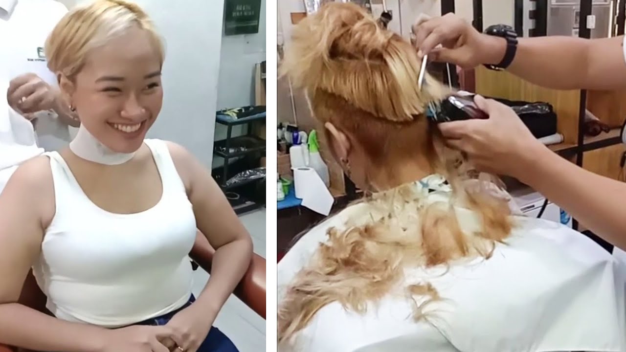 Cute blonde girl at the barber shop