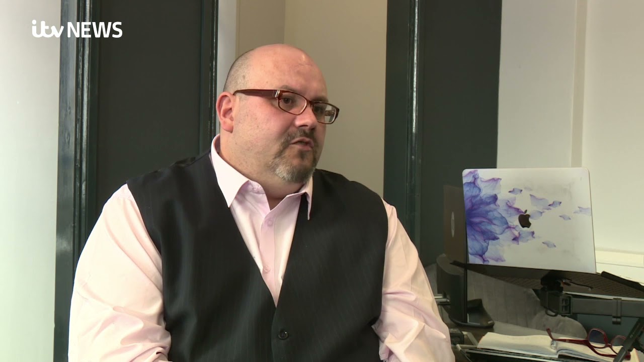 7/7 bombing survivor Daniel Biddle returns to the office for the first time after shielding