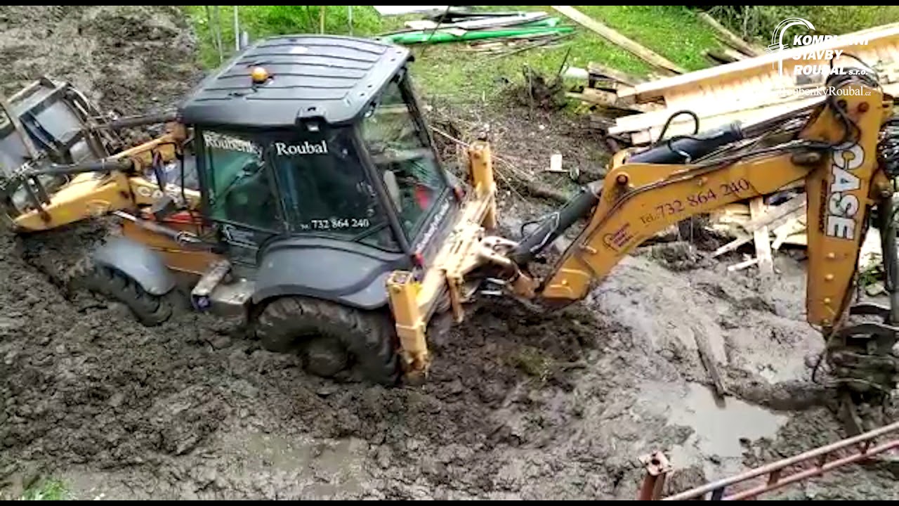 Ukázka umění řidiče od firmy Roubenky Roubal v opravdu hlubokém bahně
