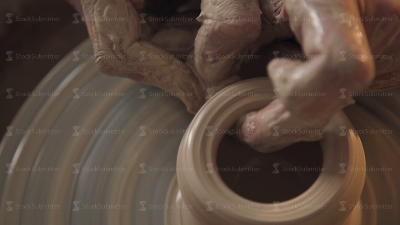 Rotating potter's wheel and clay ware on it vase : taken from above