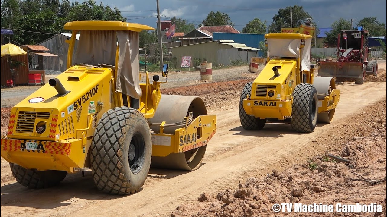Motor Grader Matador MG16 And Sakai SV521DF Road Roller Building A Road Foundation