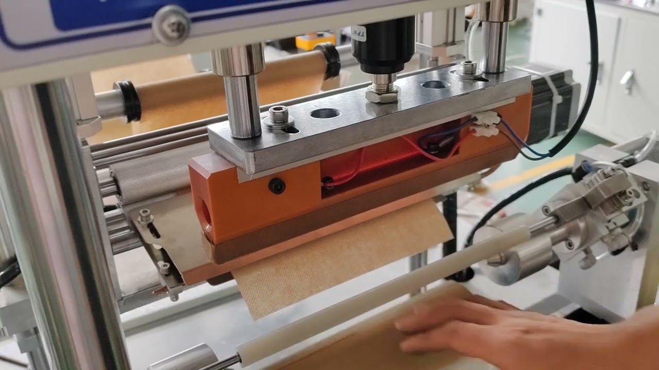 Semi auto wrapping machine for CTO carbon block