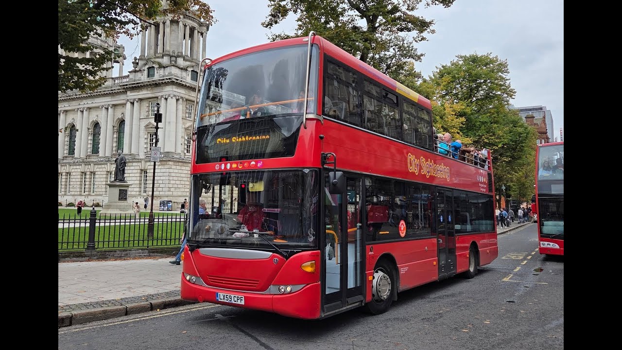 Ride on Citysightseeing Belfast Scania Omnicity LX59 CPF.