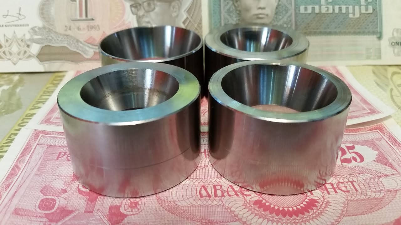 Reduction dies for coin ring making