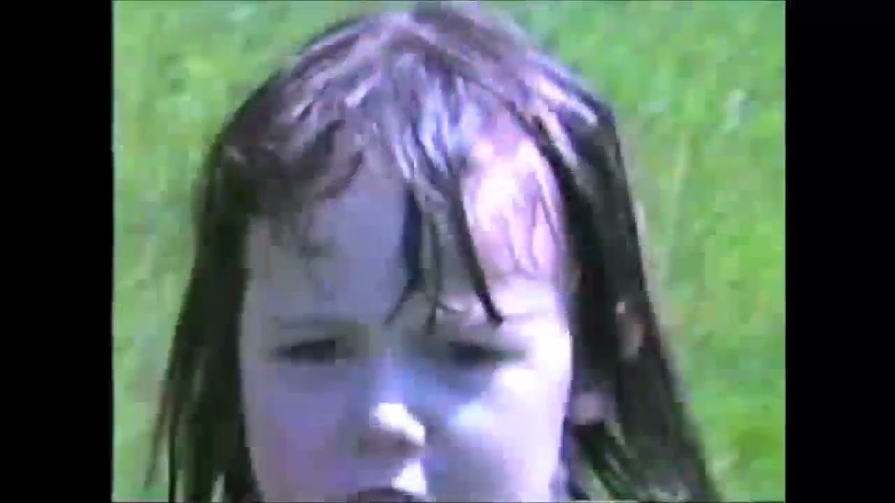 19920826 Jackie and the kids on the slip and slide.