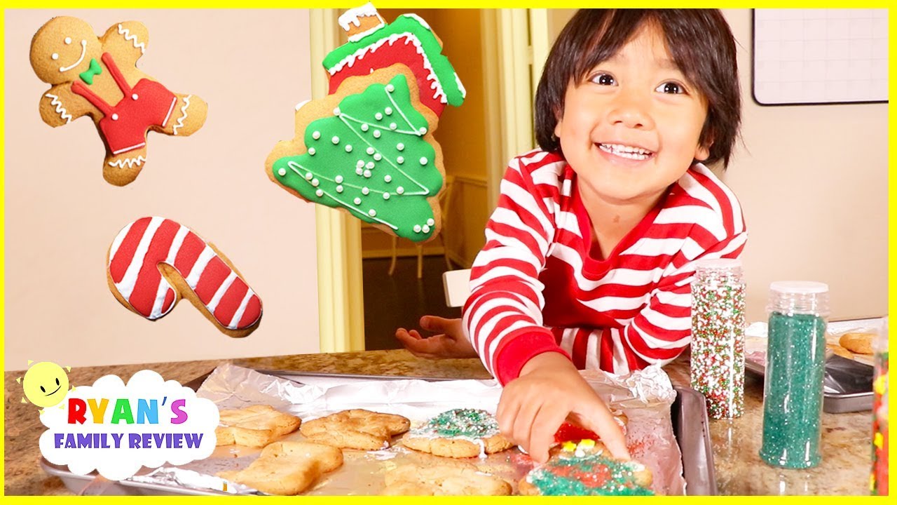 Ryan bakes kids size Christmas Cookies with Daddy and Mommy!