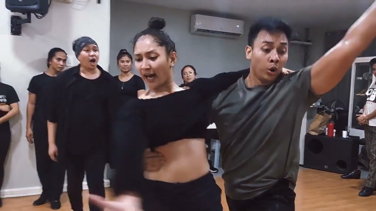 Wilbert  Aunzo and Pearl Cañeda rumba practice