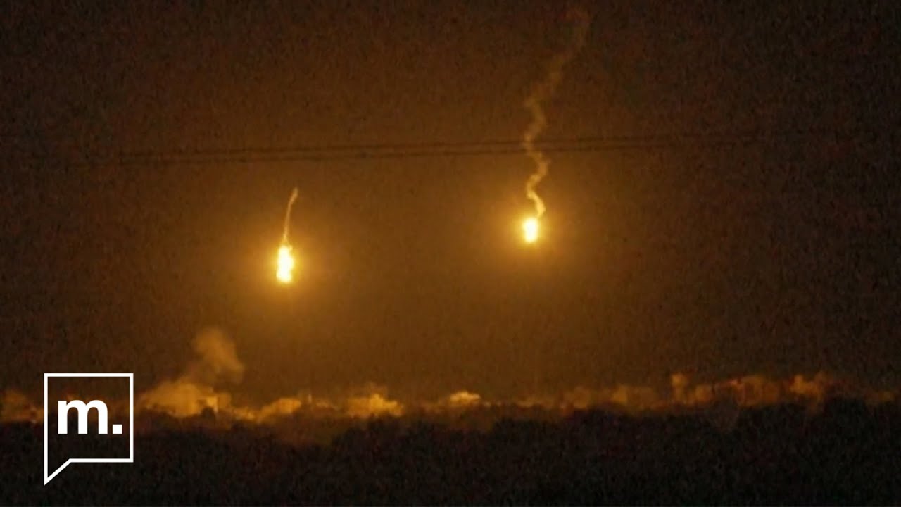 Strikes and flares tear up the night sky above Gaza