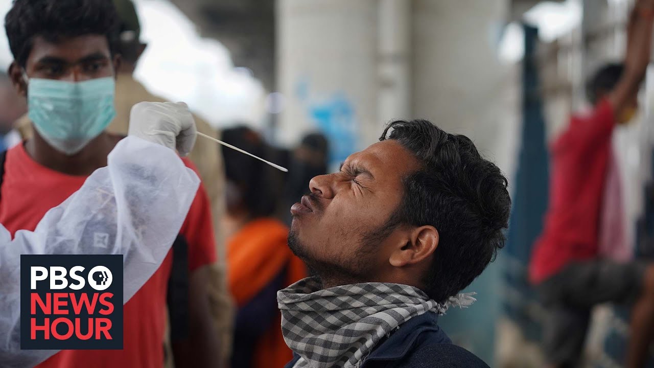 India extends door-to-door vaccine campaign as omicron variant worries officials
