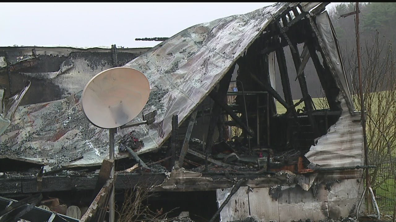 Two families watch their homes burn down in Center Township