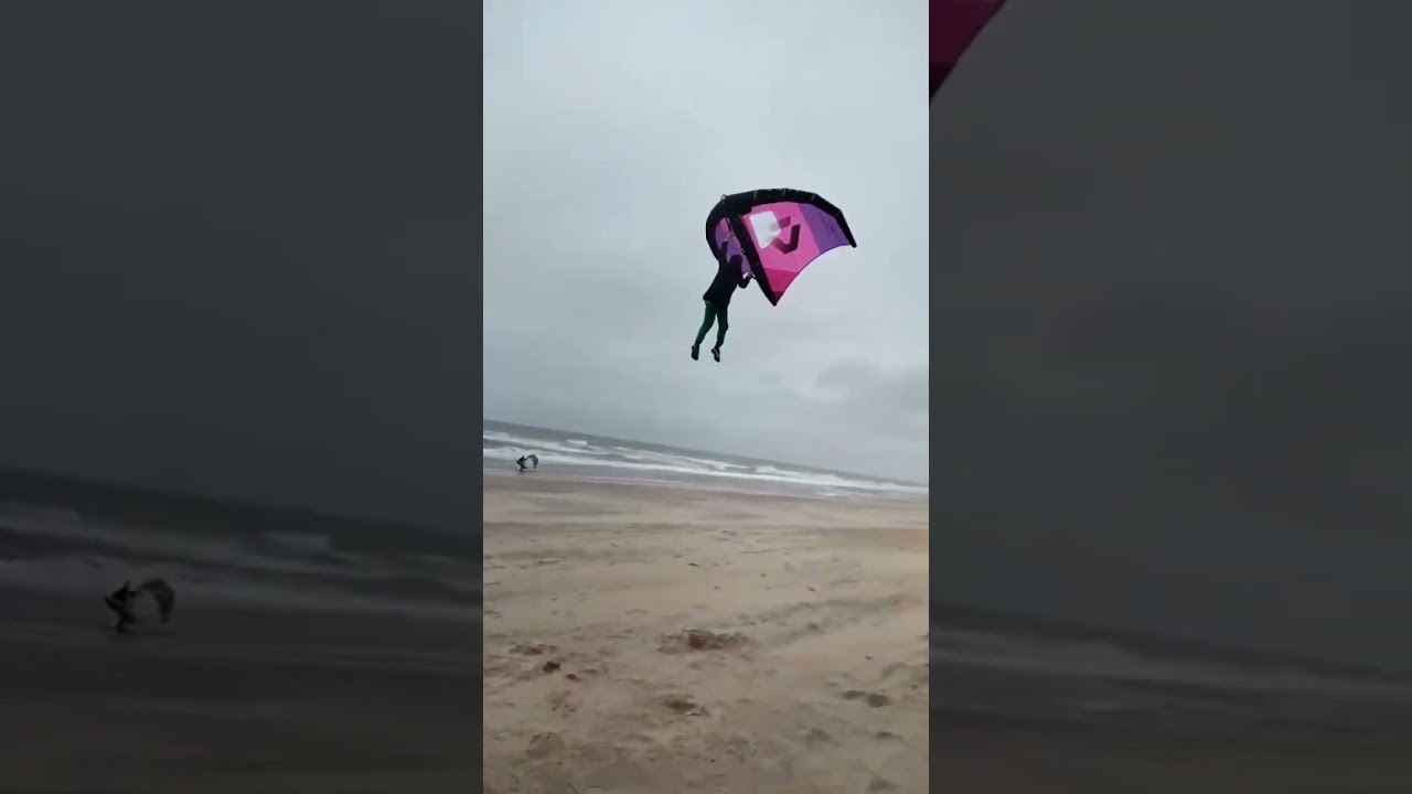 Kid flying crazy high with a wing in heavy wind! 🤯