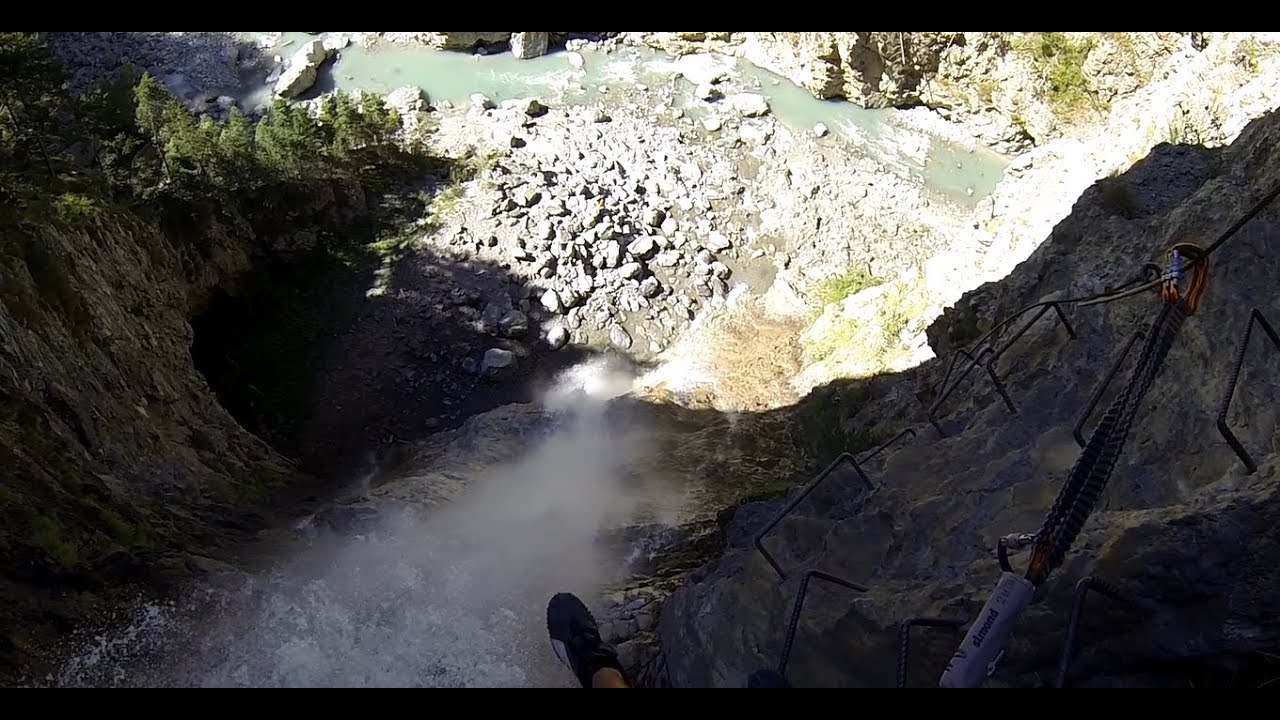 Via ferrata du diable - montée au purgatoire. Climbing with waterfalls