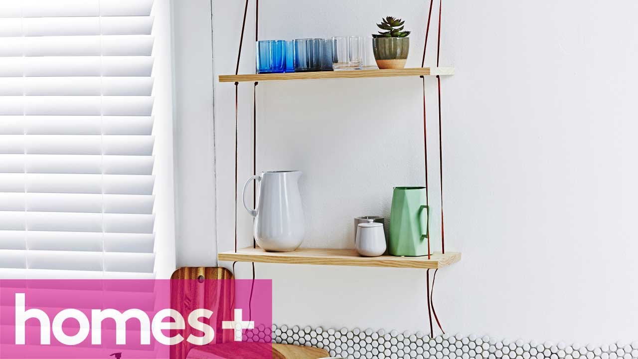 PRACTICAL IDEA: Leather swing shelf - homes+