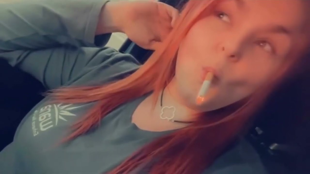 a smoking girl looking so sexy with cigarette