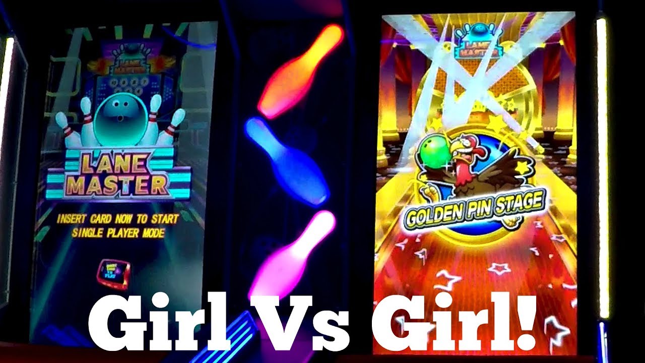 Girl Versus Girl Playing Lane Master Mini Bowling Arcade Game