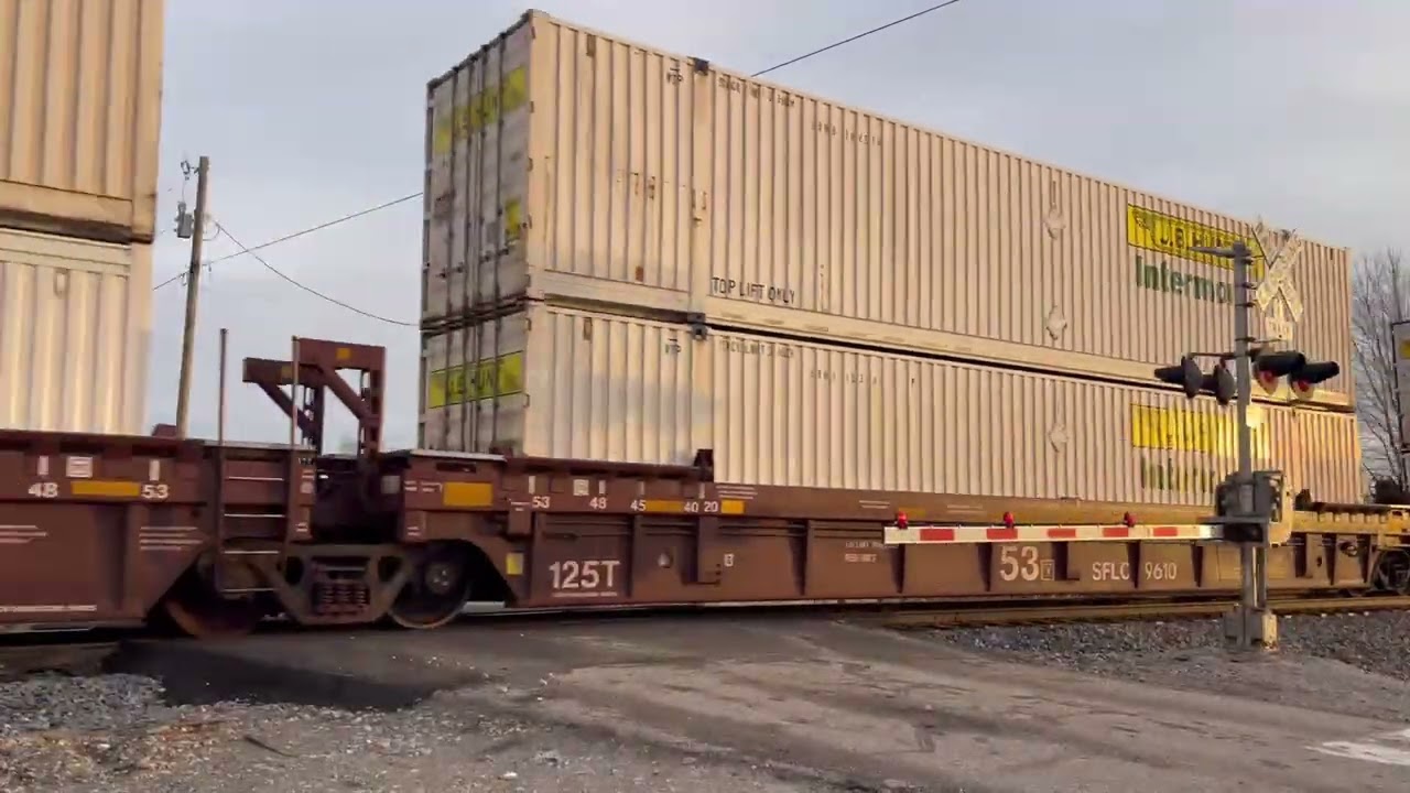 Norfolk Southern 270 Has a Good Roll on Them in the Early Morning Golden Light