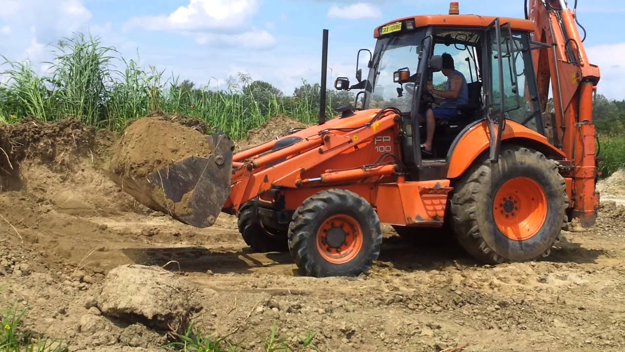 buldoexcavator la munca.la treaba tati
