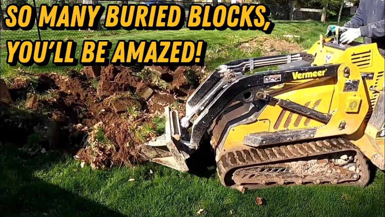 How to Remove a Buried Retaining Wall & Regrade a Steep Hill 
