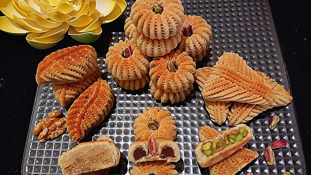 معمول الطحين الفاخر شغل معلمين بطريقه مميزه وطعم خراااااافي وسر الحفاظ ع شكل الرسمه بعد التحمير