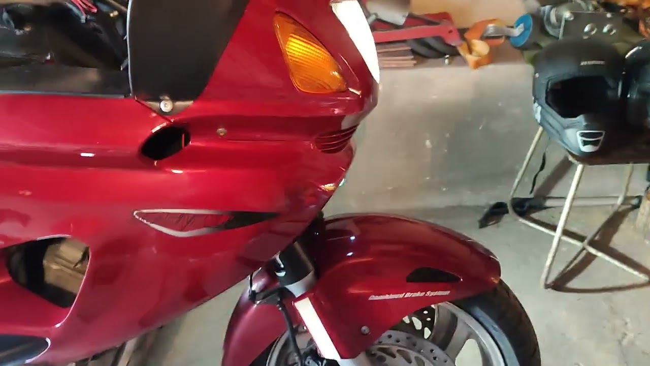 honda deauville 650 2003 with dominator exhaust
