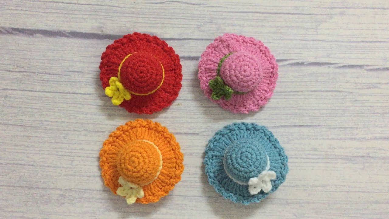 Crochet hat hair clips with a little flower
