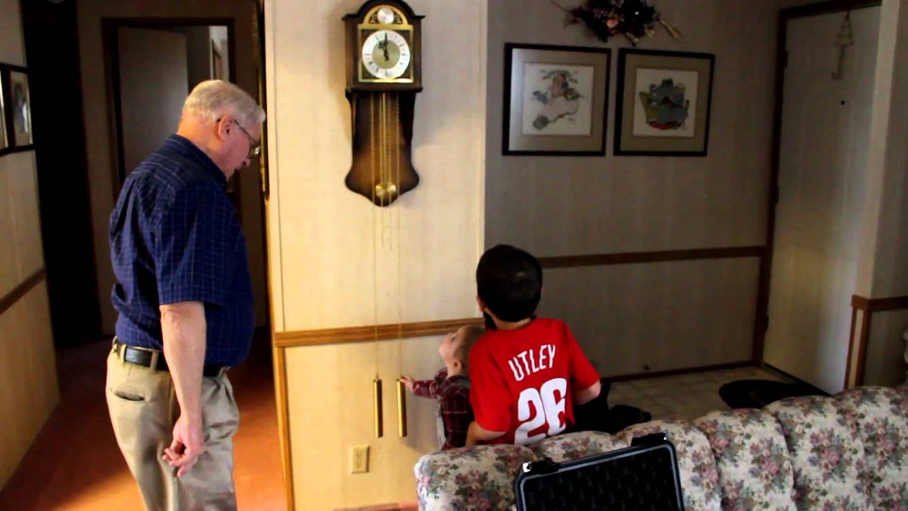 Milo Investigating Grandpa's Grandfather Clocks