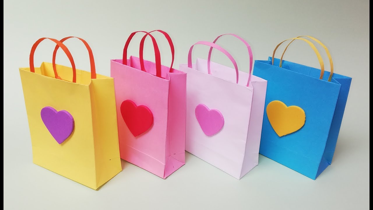 Como hacer bolsas de papel para regalo. Muy facil
